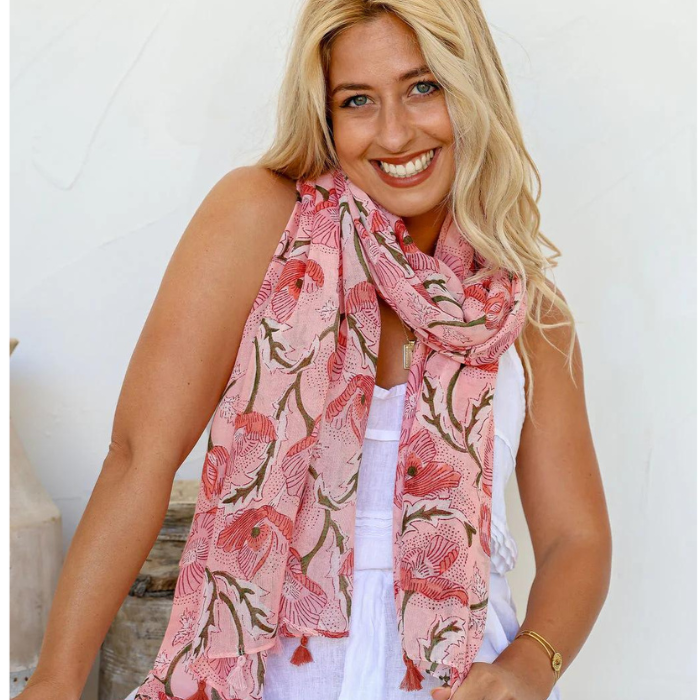 Floral printed scarf
with tassel details